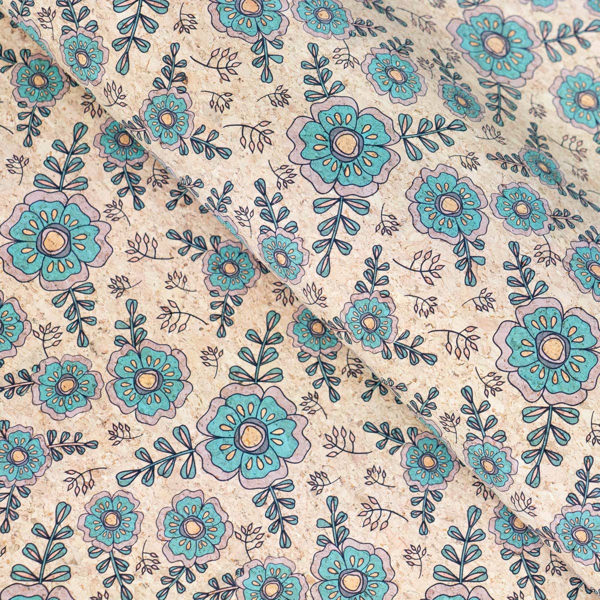 Élégance botanique : motif floral bleu sarcelle et vert sur un support en liège