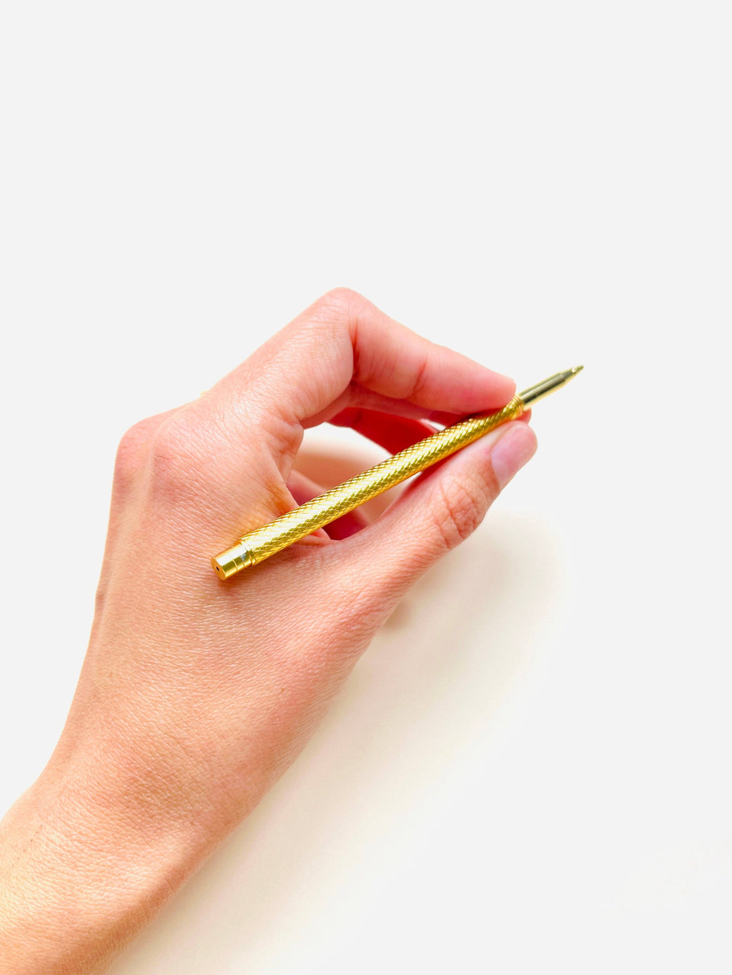 Stylo à bille à écailles doré