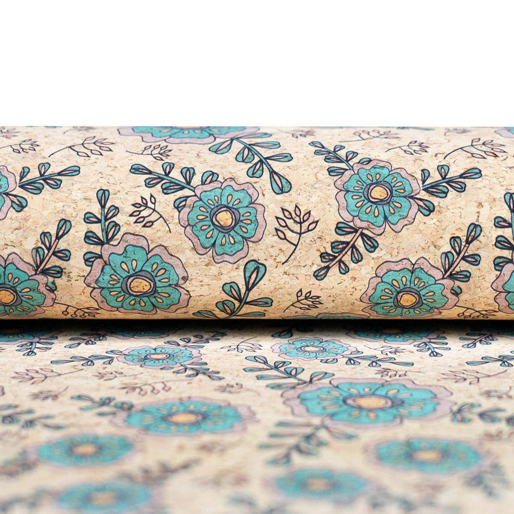 Élégance botanique : motif floral bleu sarcelle et vert sur un support en liège