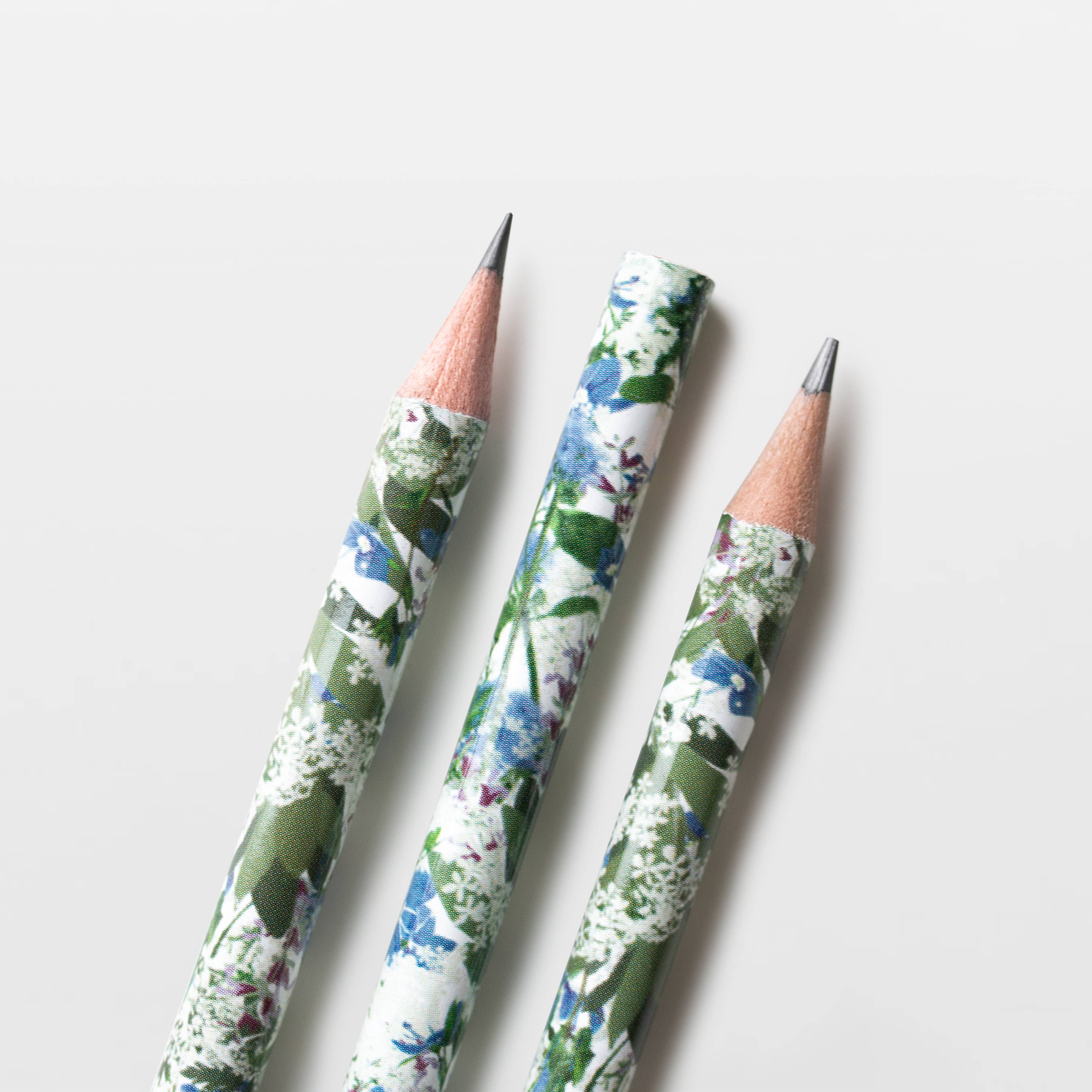 Crayon motif floral bleu blanc vert